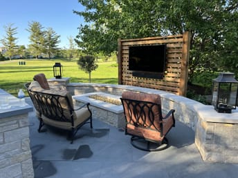 outdoor TV and fire pit